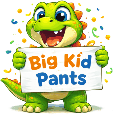 Jax holding a Big Kid Pants sign